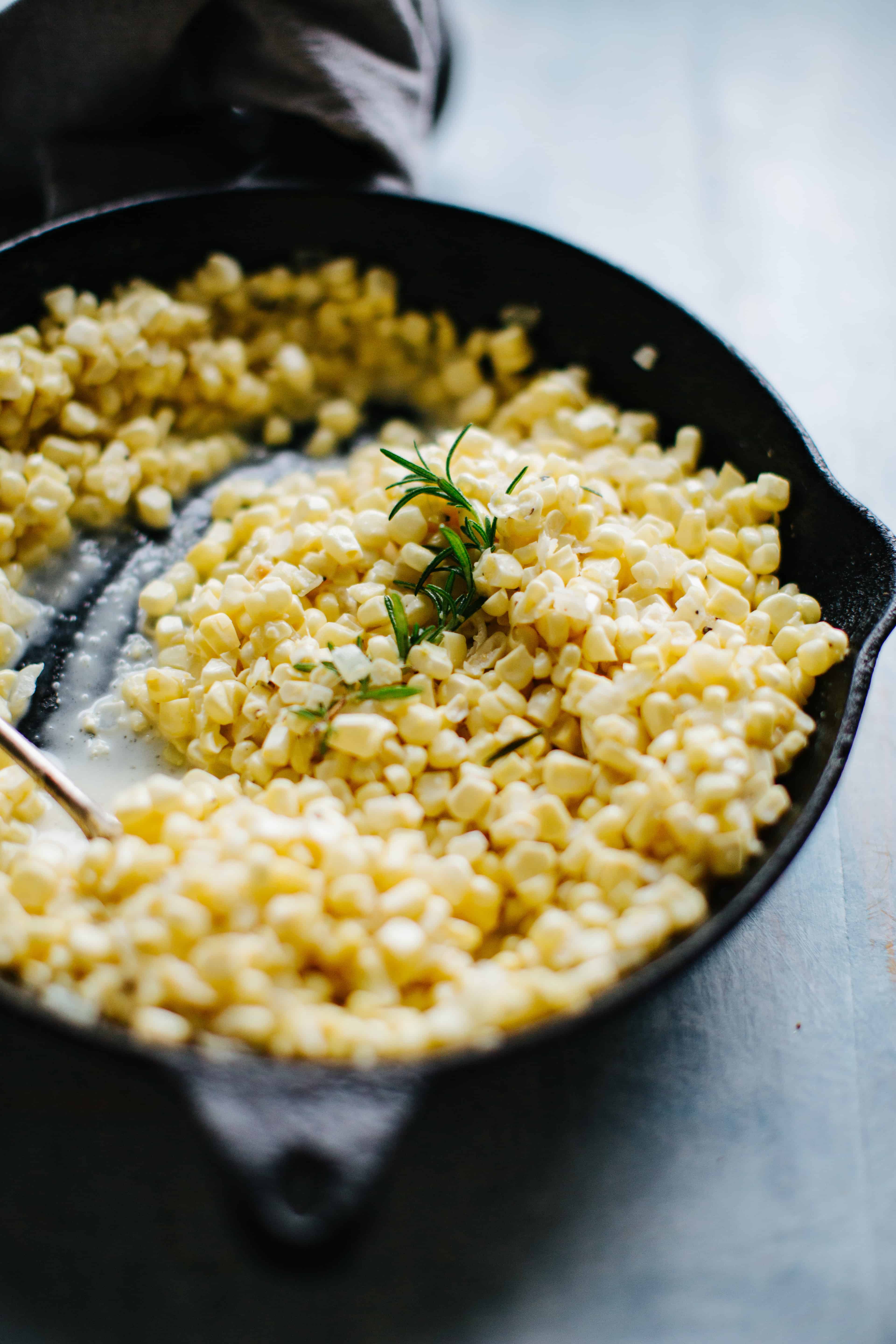rosemary creamed corn in the pan