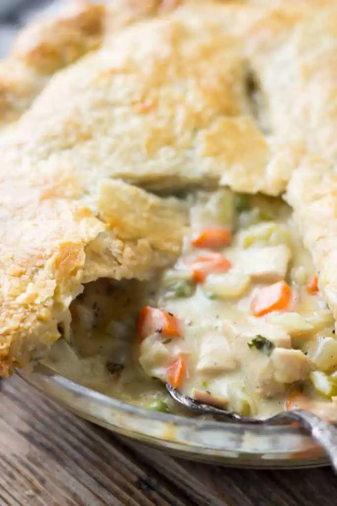 Close up of the filling inside a baked chicken pot pie.