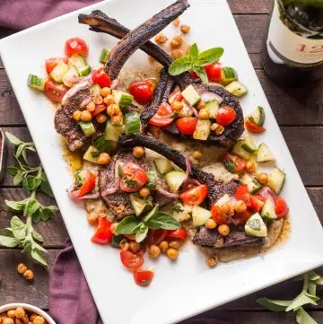 Grilled Lamb Chops with Eggplant Puree, Tomatoes, Cucumbers + Crispy Chick Peas