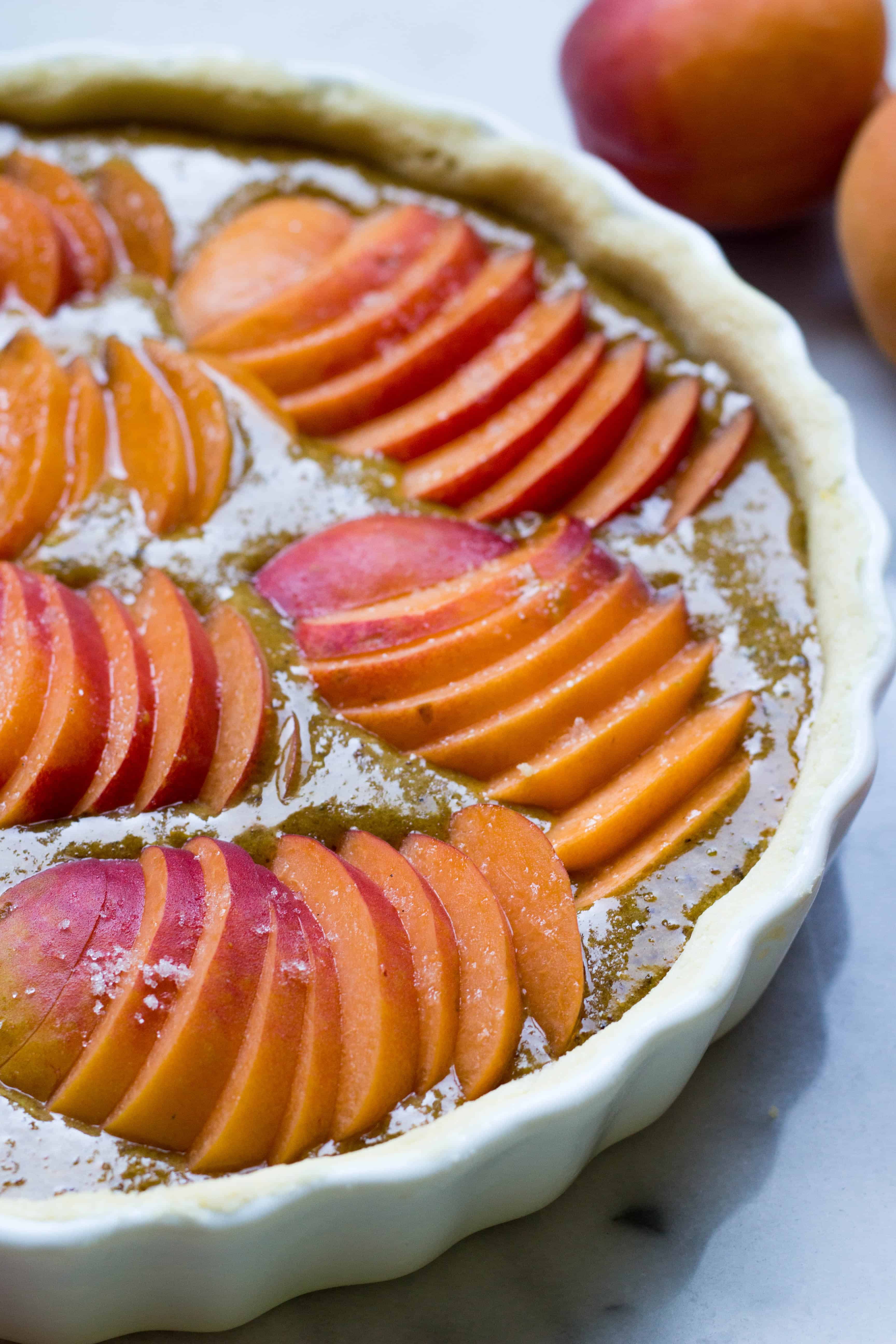 Top view of unbaked apricot pistachio tart recipe.