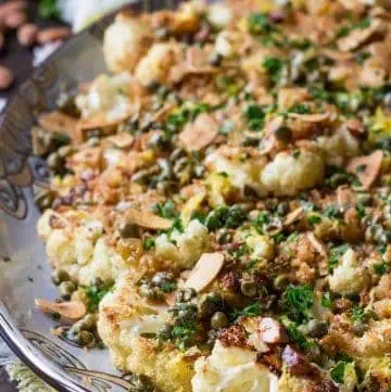 Roasted Cauliflower with Breadcrumbs, Capers, Almonds + Raisins