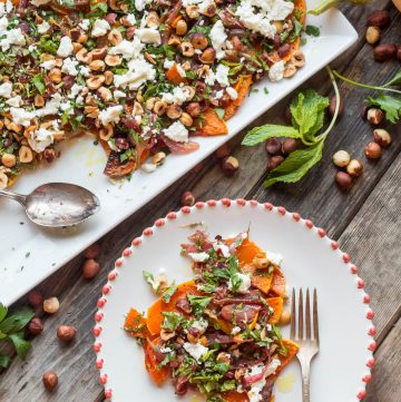 Roasted Butternut Squash with Goat Cheese, Hazelnuts + Lime. An awesome vegetarian main or unique Thanksgiving side! | ColeyCooks.com