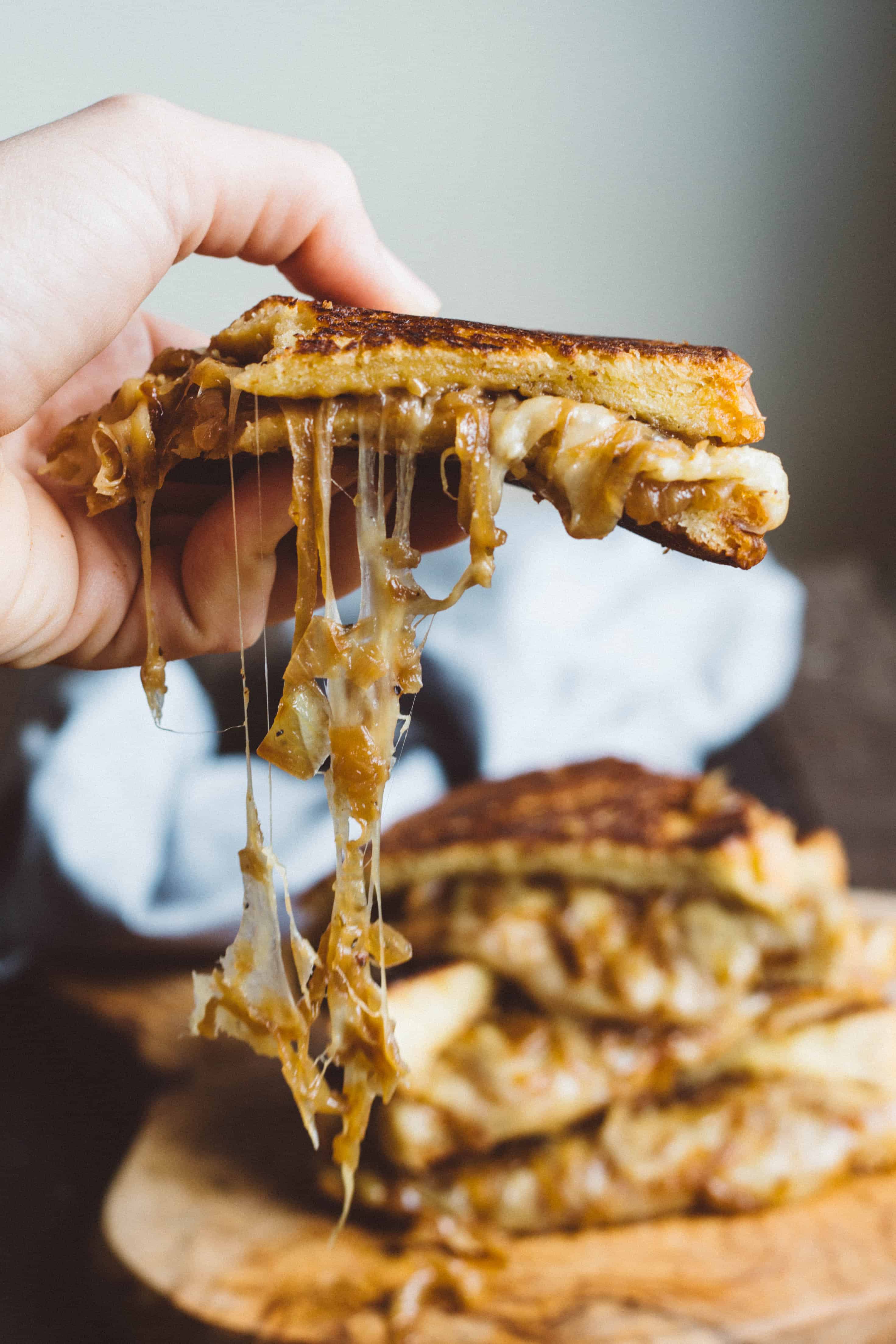 French Onion Grilled Cheese (Video!) - Overflowing with caramelized onions and melty, cheesy goodness! | Coley Cooks