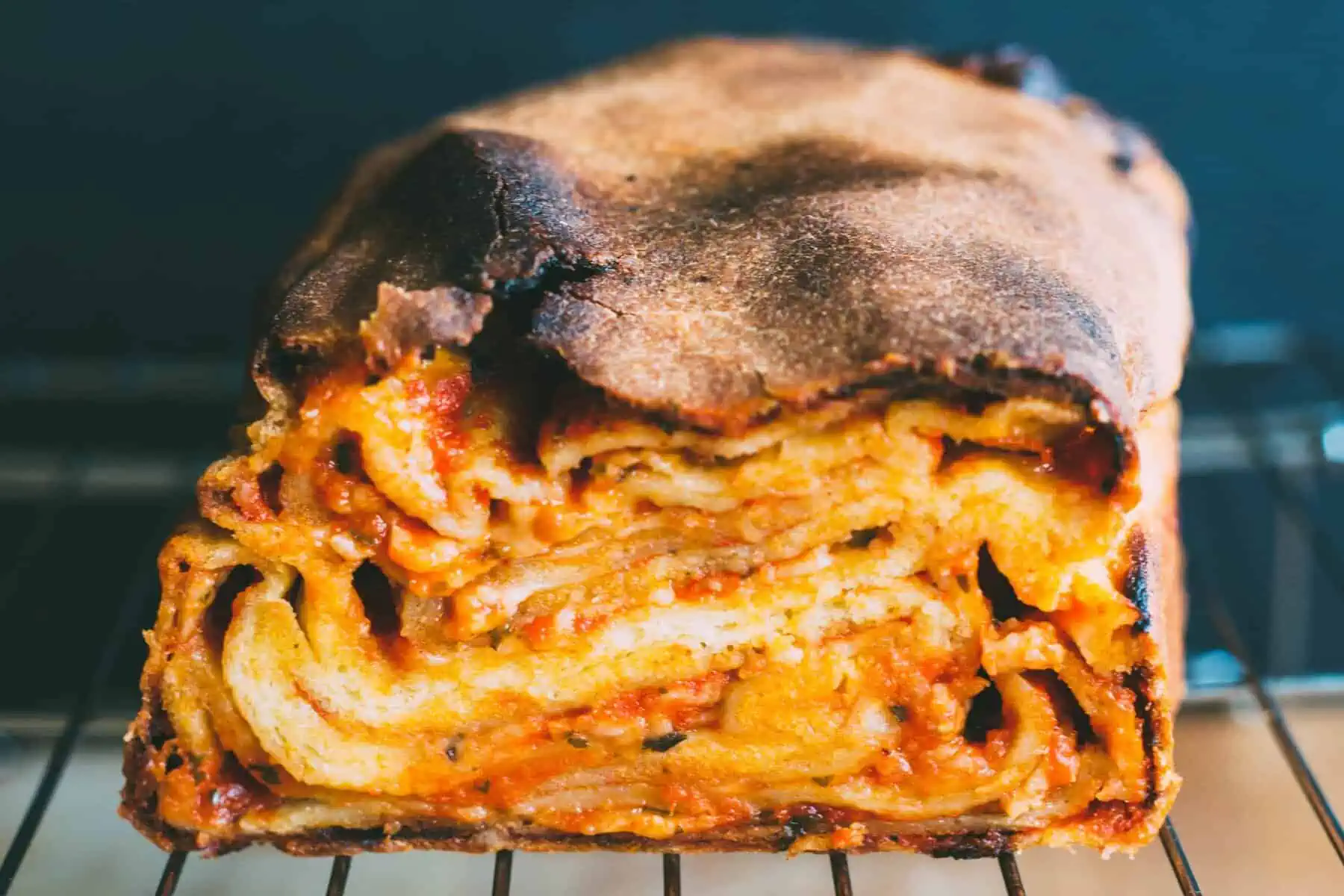 Close up of layers of dough inside a pizza babka.