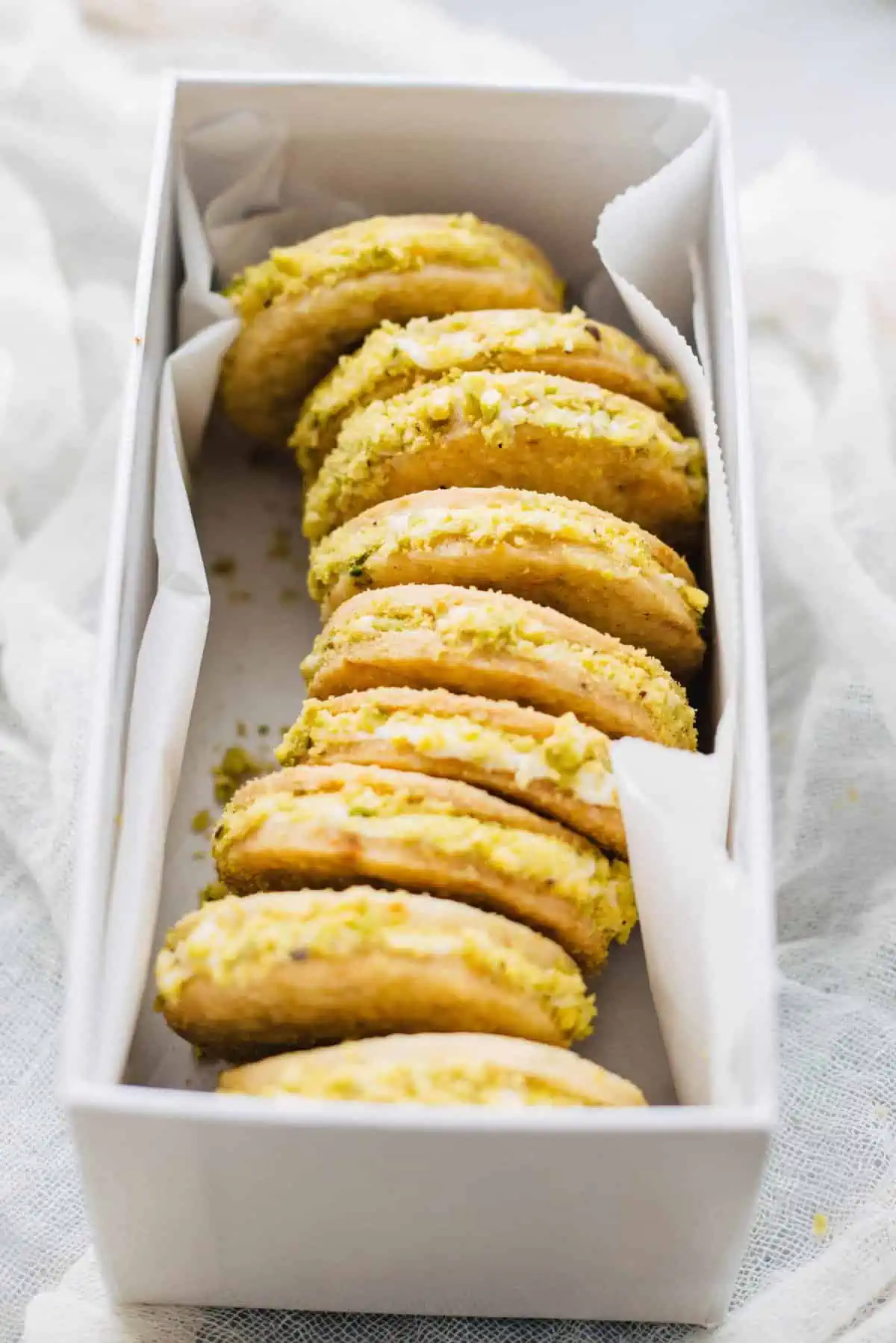 Meyer Lemon + Pistachio Sandwich Cookies | ColeyCooks.com