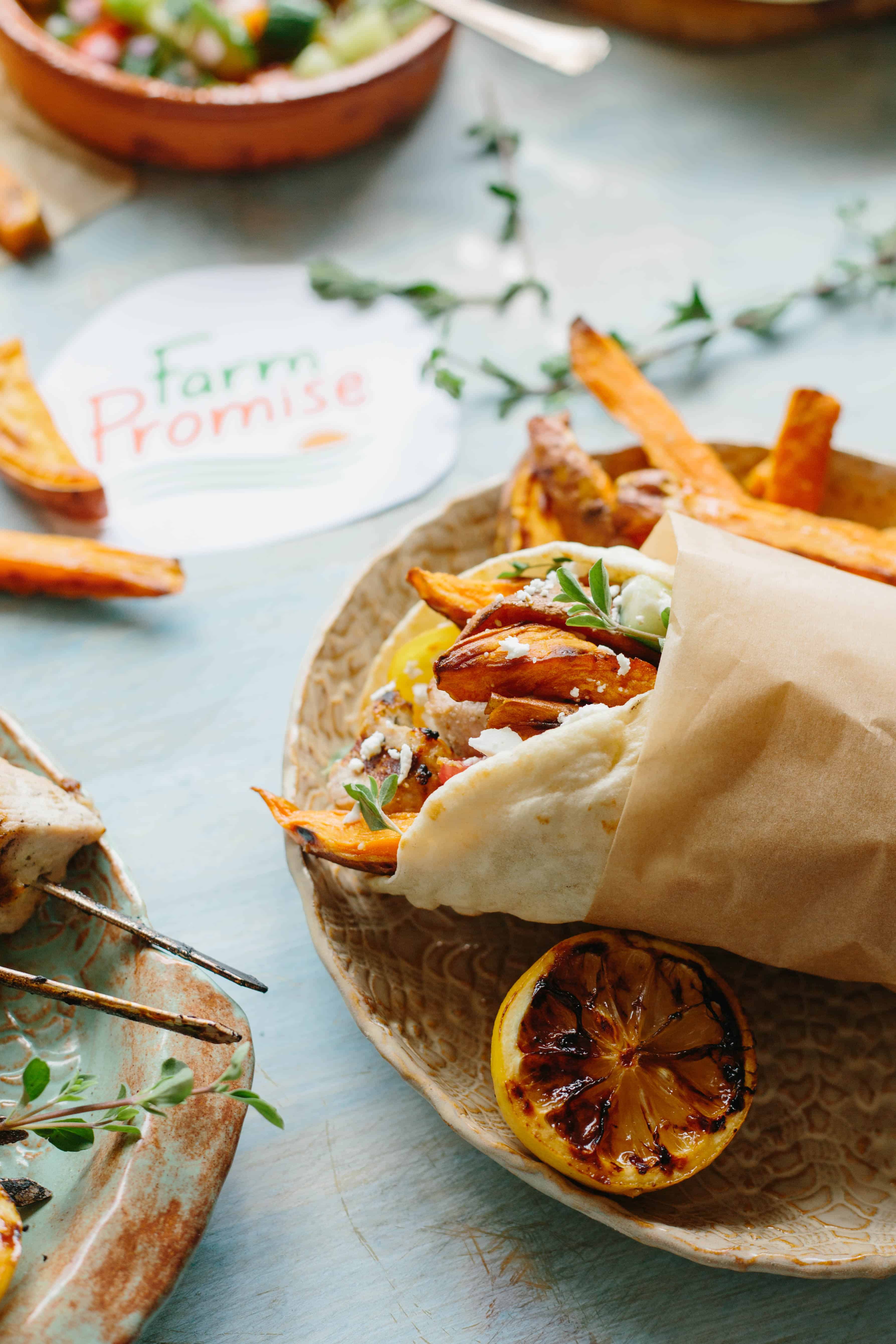 Pork and sweet potatoes wrapped up with salad in a pita.