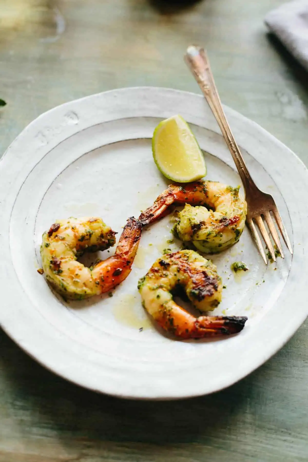 Citrus herb grilled shrimp on a lunch plate.