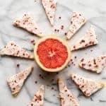 Pink grapefruit shortbread cookies cut in triangles.