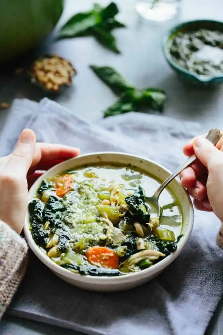 An Italian soup made with pesto chicken, kale and white beans.