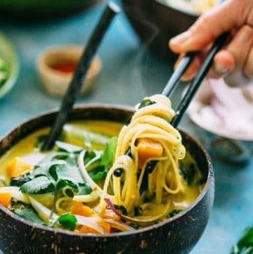 This Butternut Squash + Spinach Coconut Curry Noodle Soup is an easy, warm and flavorful soup recipe that's naturally vegan and gluten free! #vegan #gf #glutenfree #rice #noodles #easy #soup #recipe #coconut #curry #spinach | ColeyCooks.com