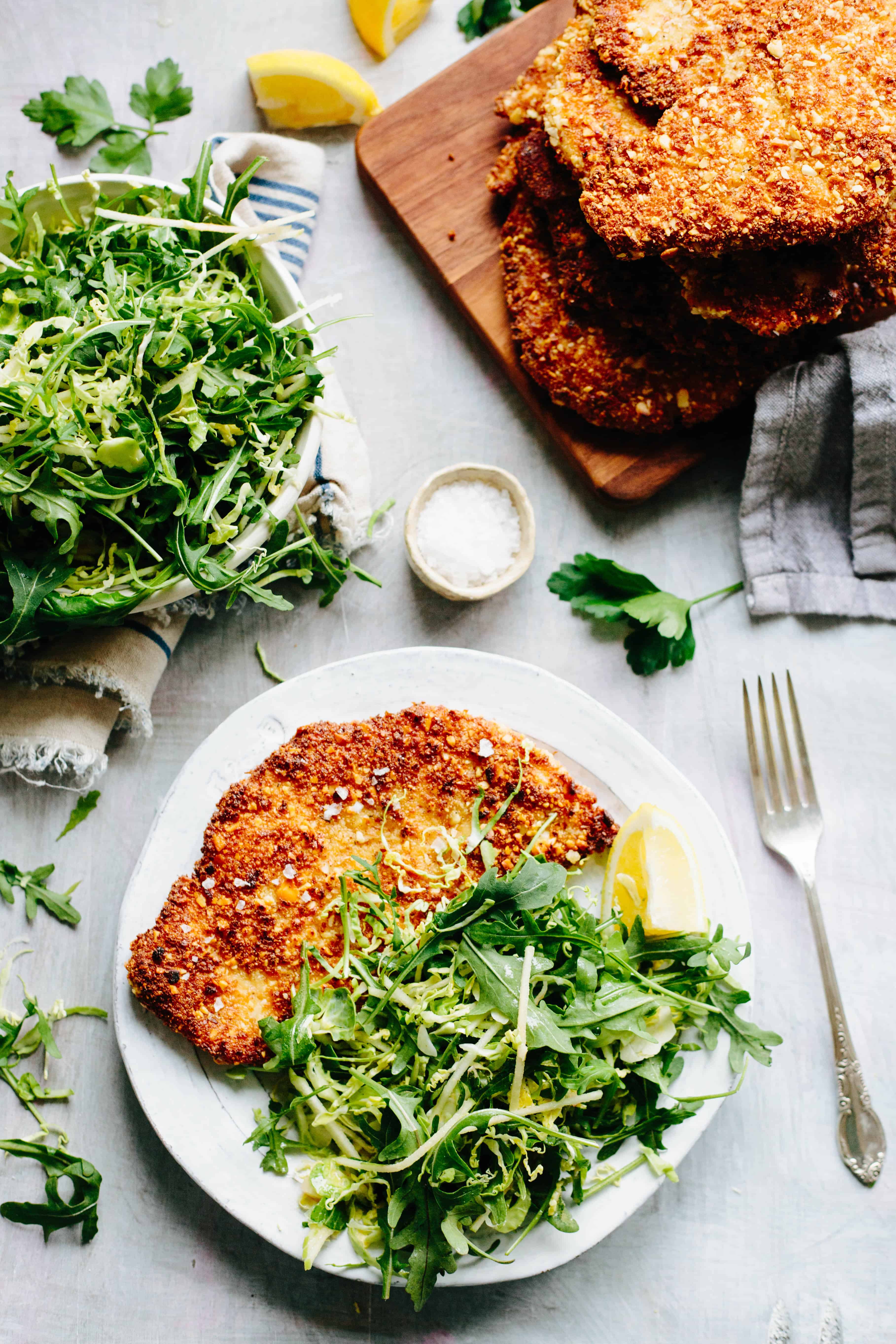 Almond chicken cutlets with apple, arugula + brussels sprout salad