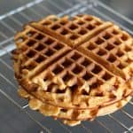 Close up of waffles on a cooling rack.