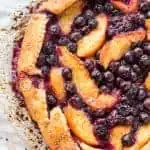 Top view of a blueberry peach crostata.