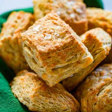 basket of biscuits with green napkin