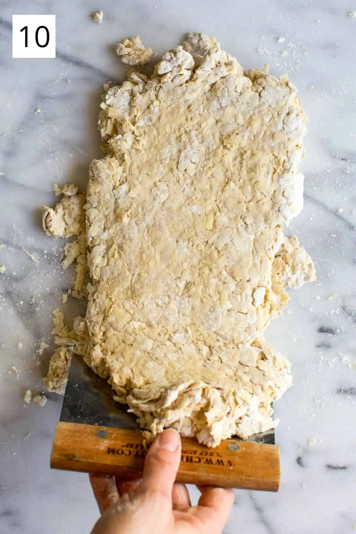 folding biscuit dough with dough scraper