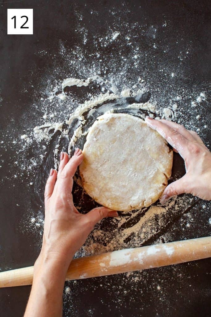 hands rotating a disc of pie dough