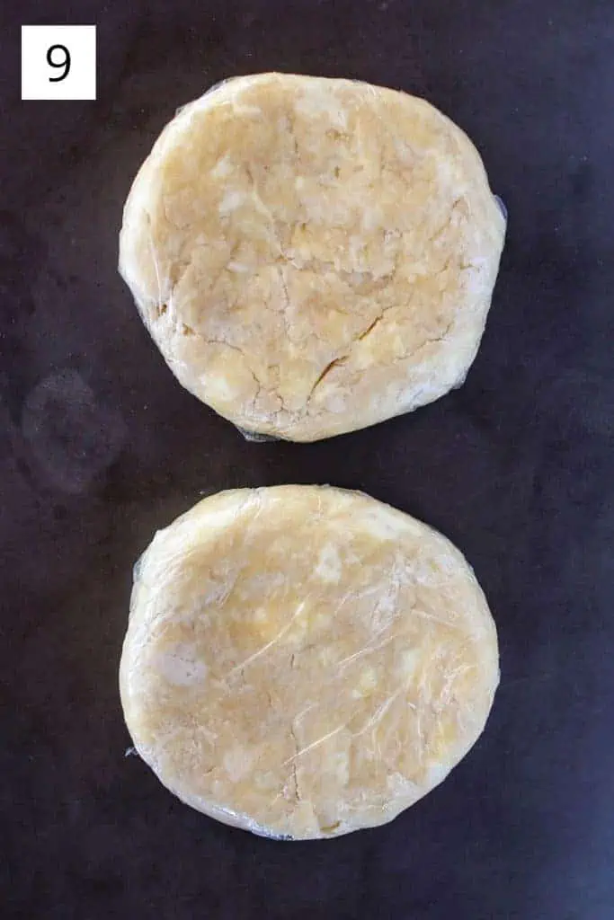 two discs of wrapped pie dough