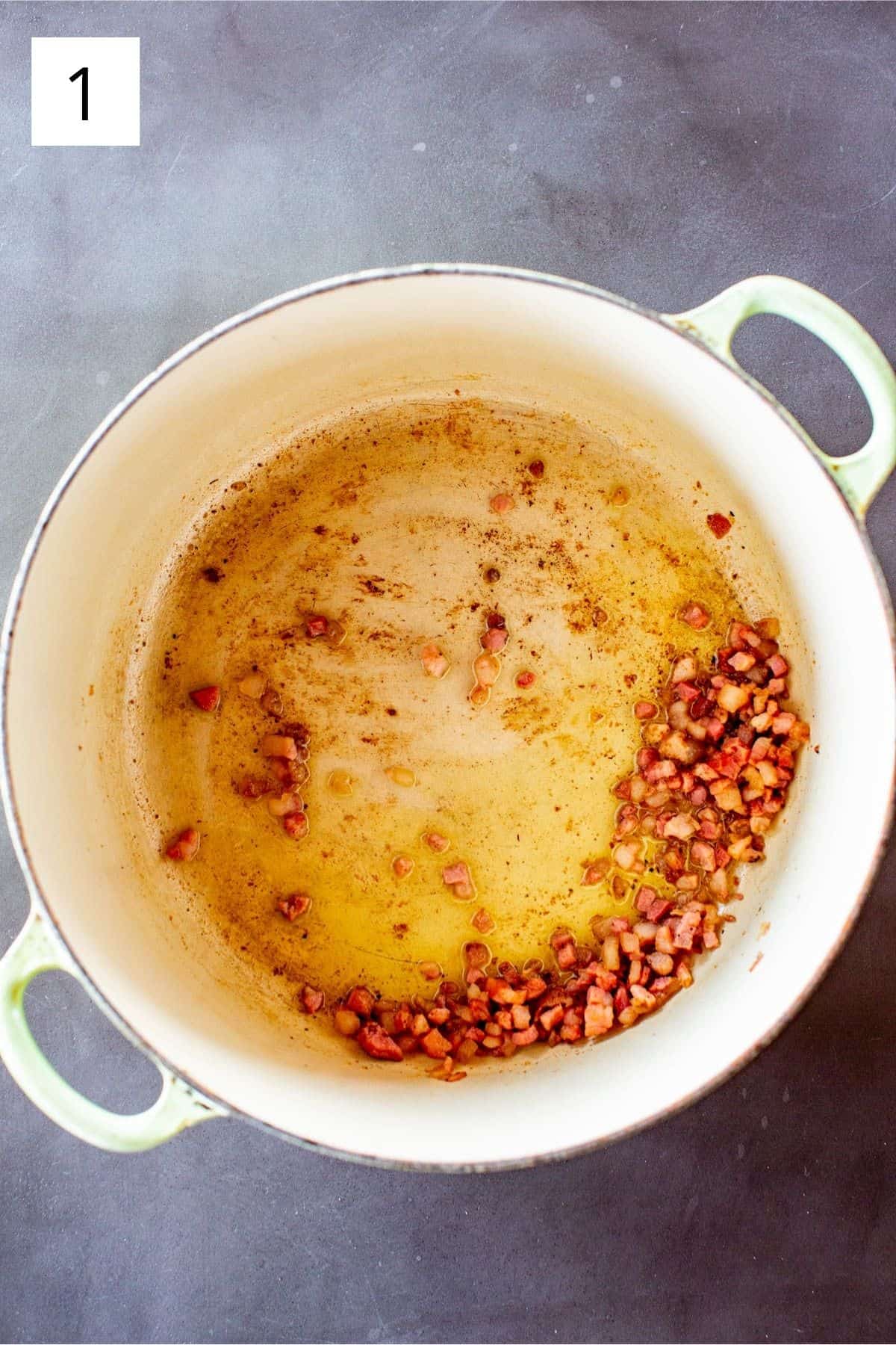 rendered pancetta in a dutch oven