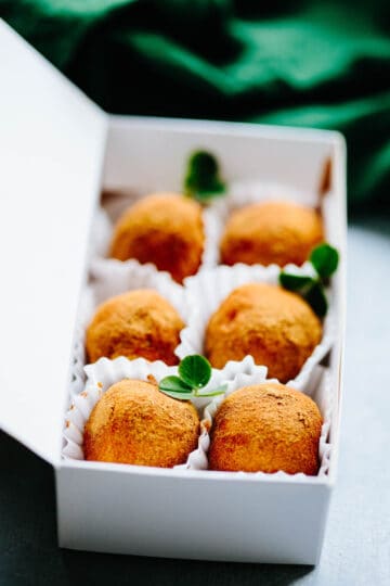 close up of a box of candies with shamrocks