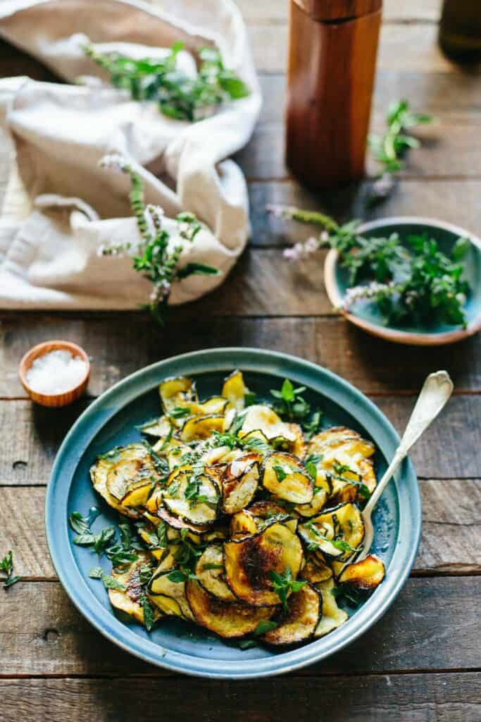 Zucchine alle Scapece on a plate with fork