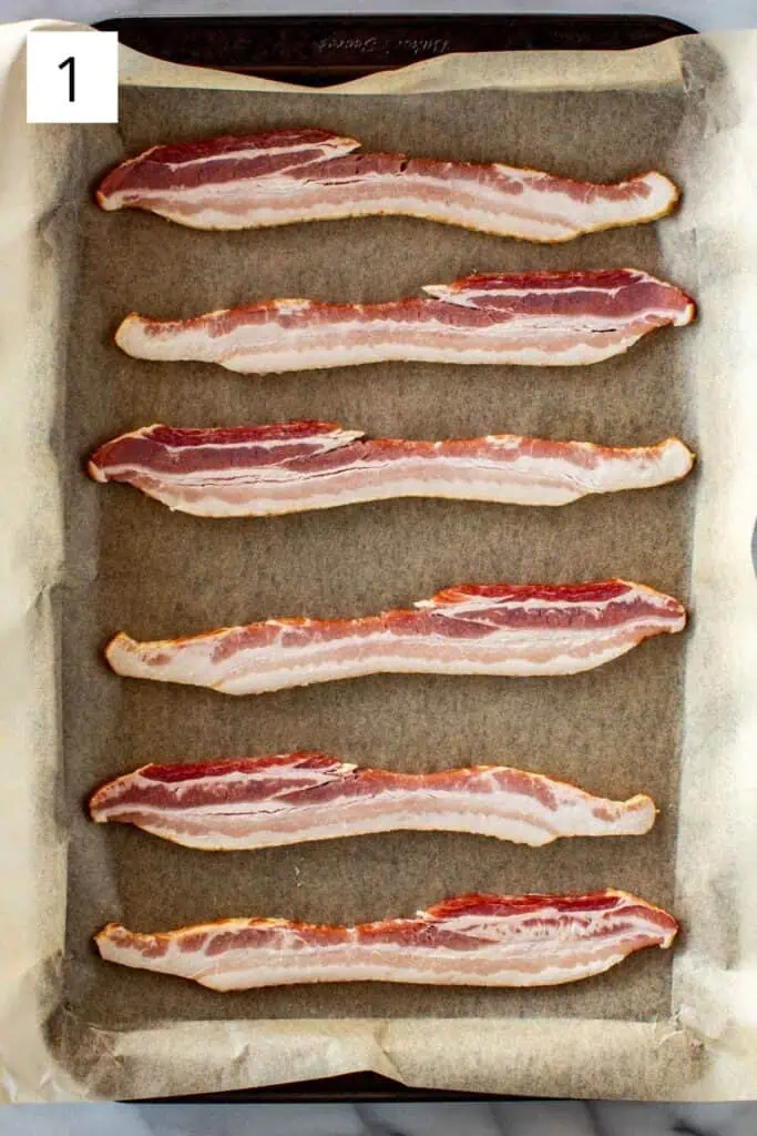 Bacon on a parchment lined sheet pan.