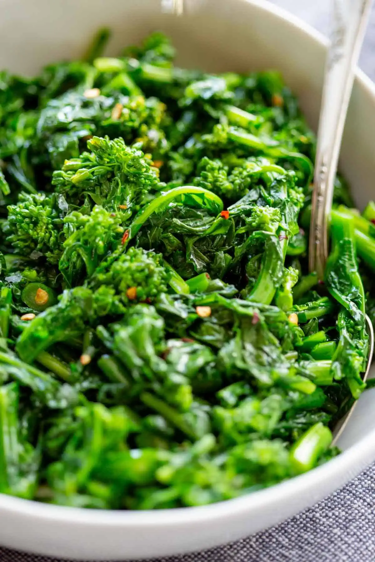 Close up of sautéed broccoli rabe in a bowl.