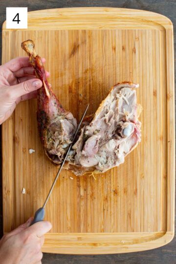 Separating the drumstick from the thigh on a roasted turkey.