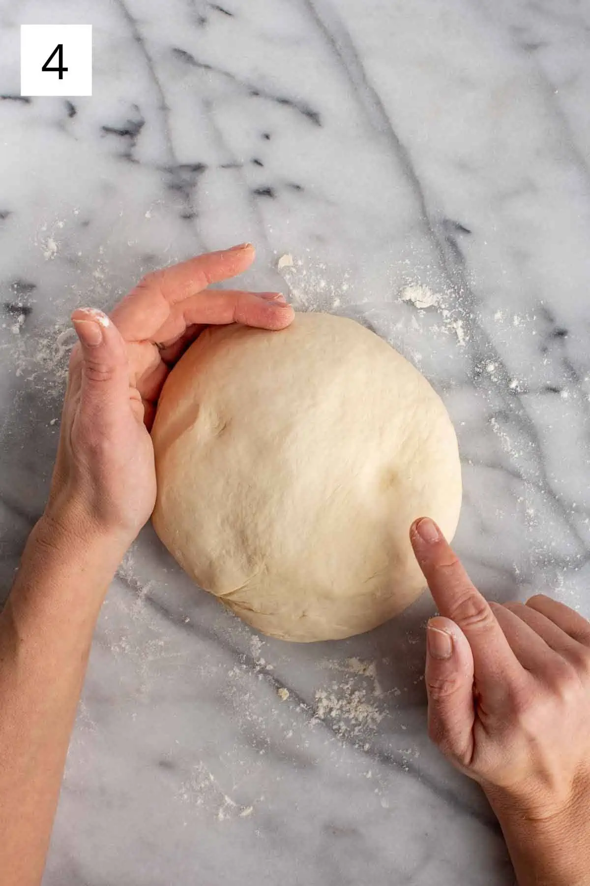 Shaping dough into a ball.
