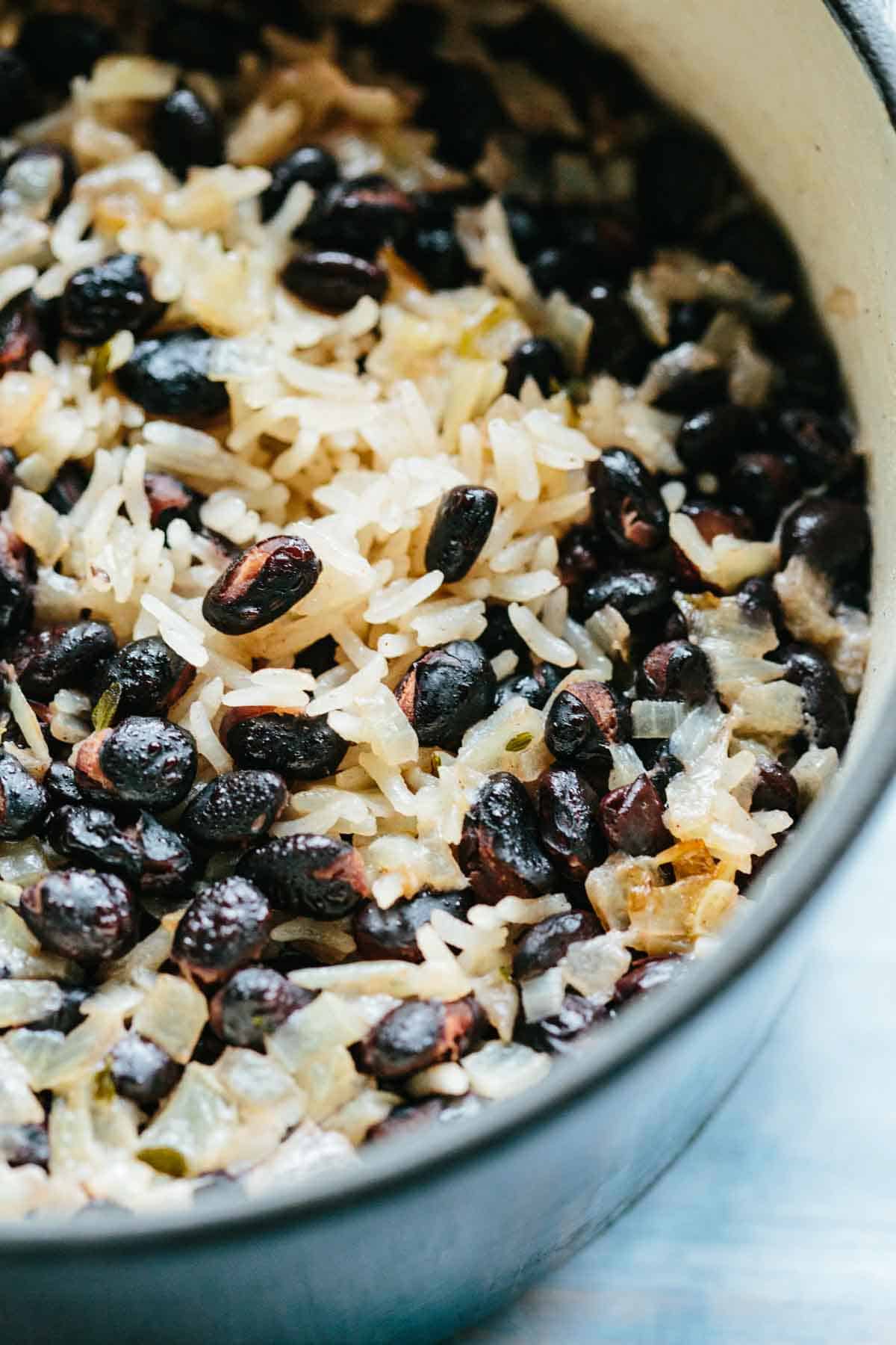 Caribbean rice and black beans with coconut in a pot.