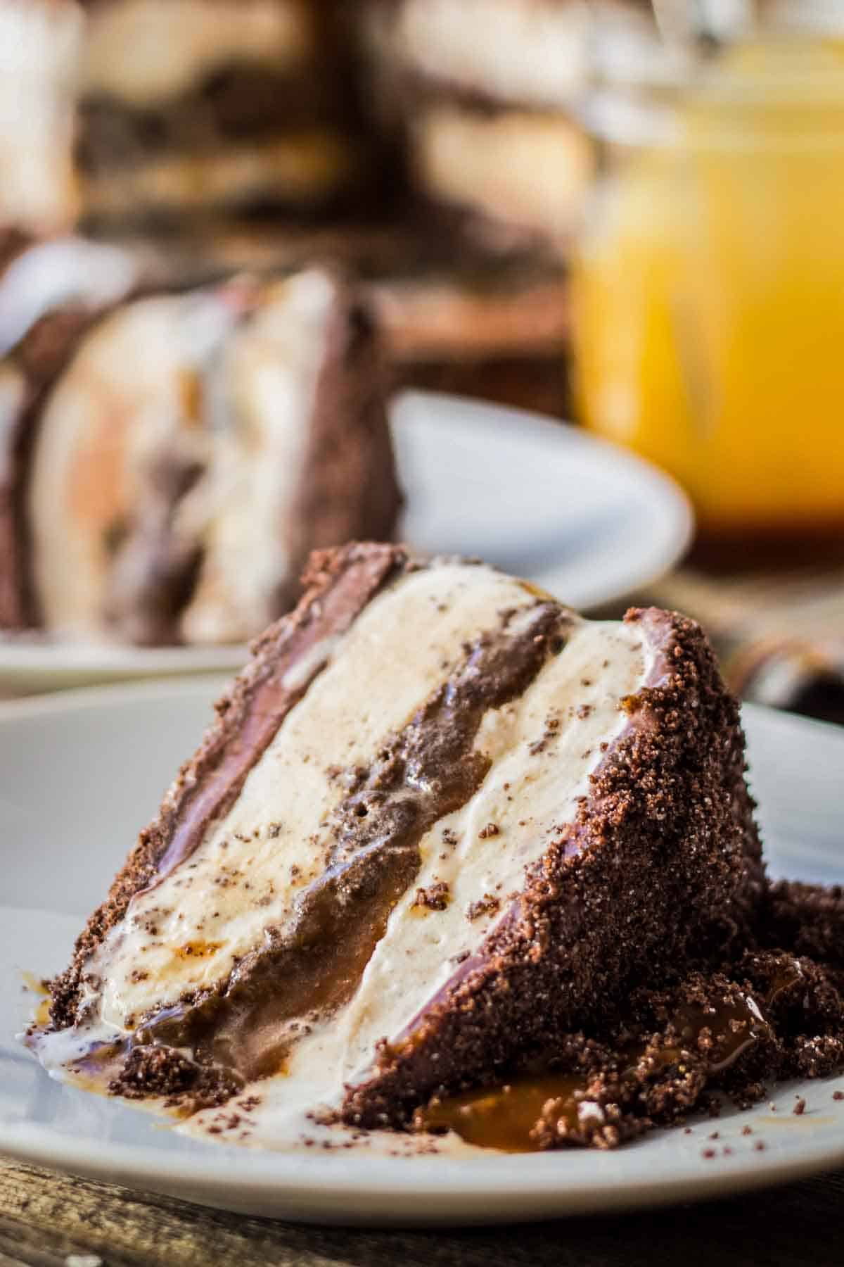 A slice of homemade salted caramel and chocolate ice cream cake.