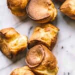 Deeply browned and puffed up muffin tin popovers.
