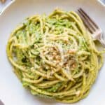 a bowl of spaghetti with shaved asparagus and ramp pesto.