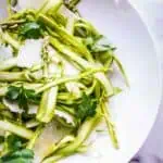 Thinly shaved ribbons of asparagus tossed with Pecorino Romano cheese and parsley.