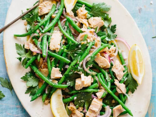 green bean and tuna salad with basil dressing Lingerie-style dress in sequins with rebrodé lace