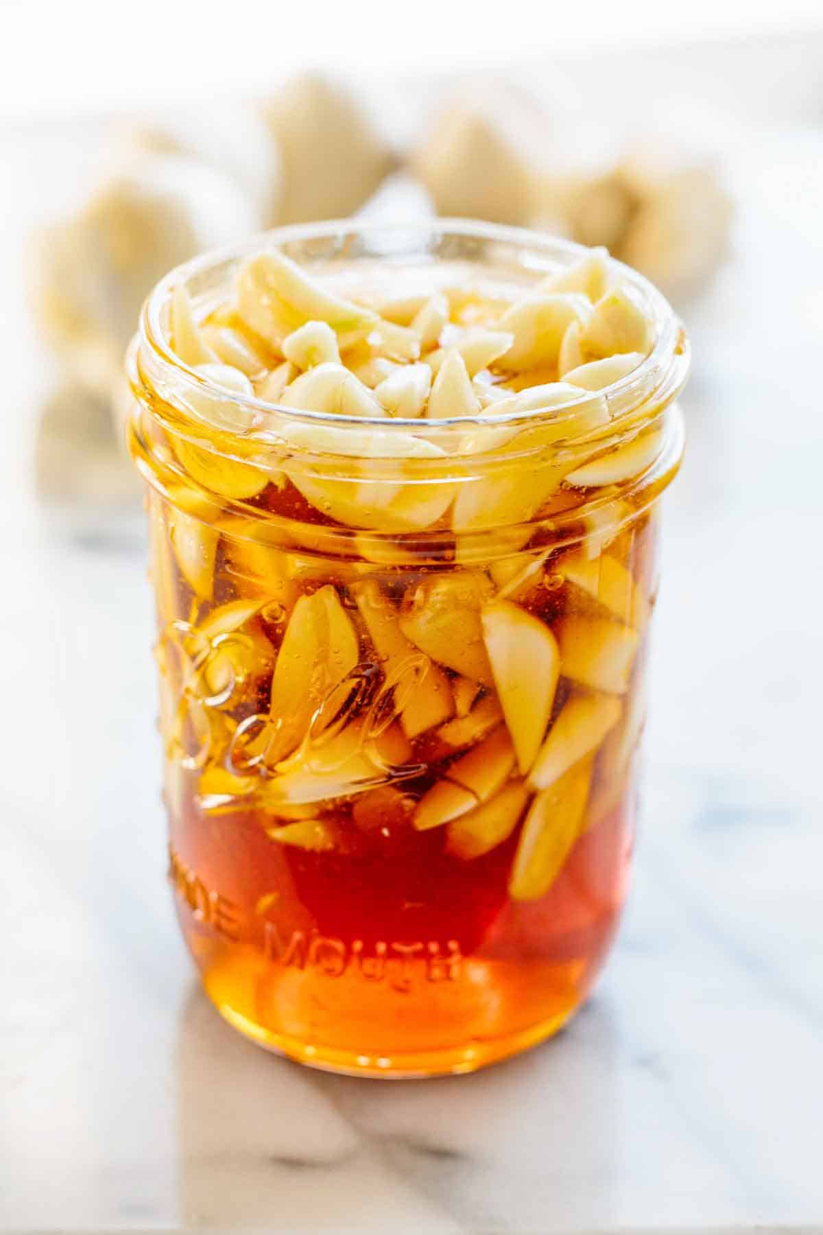 A jar of fermented garlic honey.