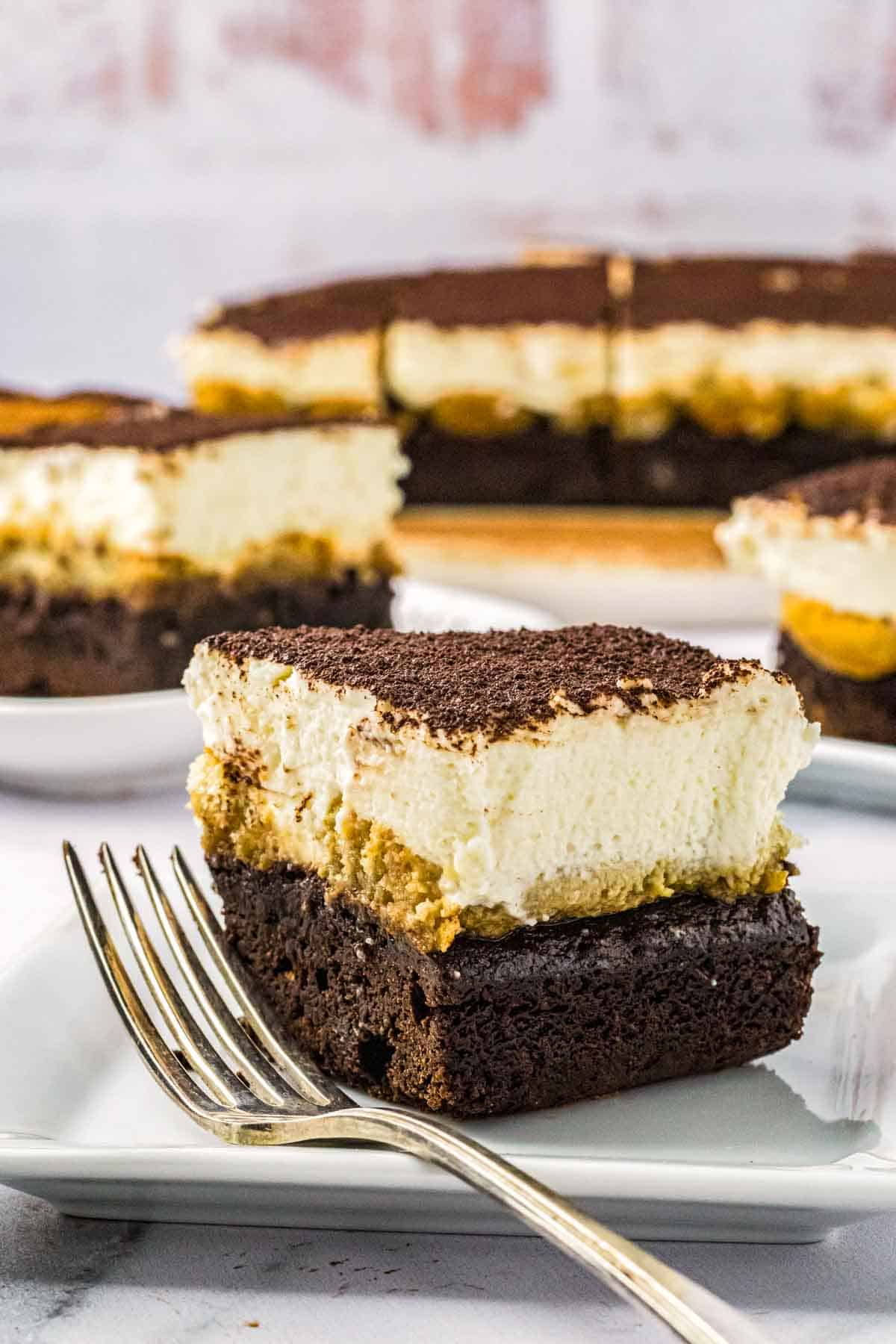 A slice of of tiramisu brownie on a plate. 