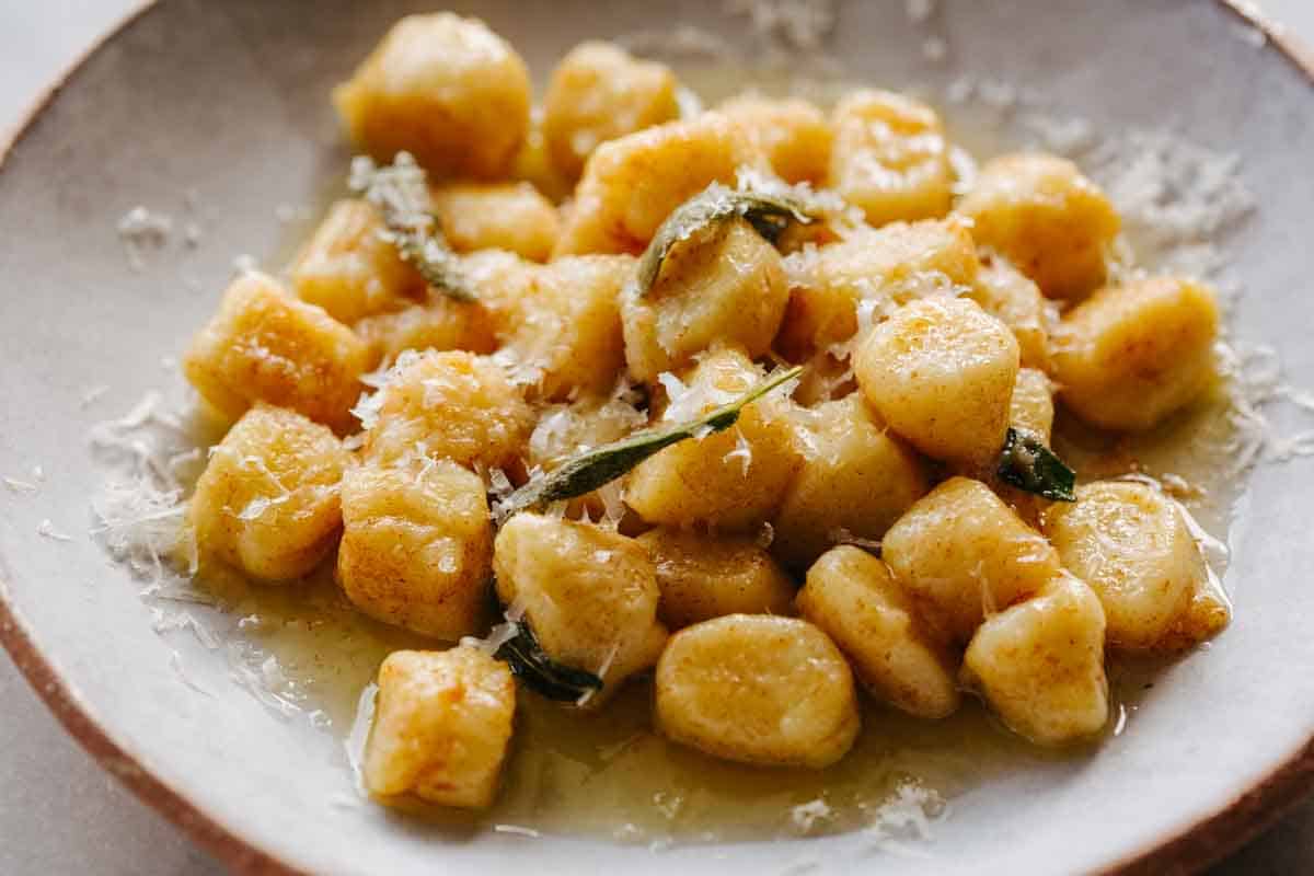 Light and pillowy potato gnocchi tossed with brown butter and sage.