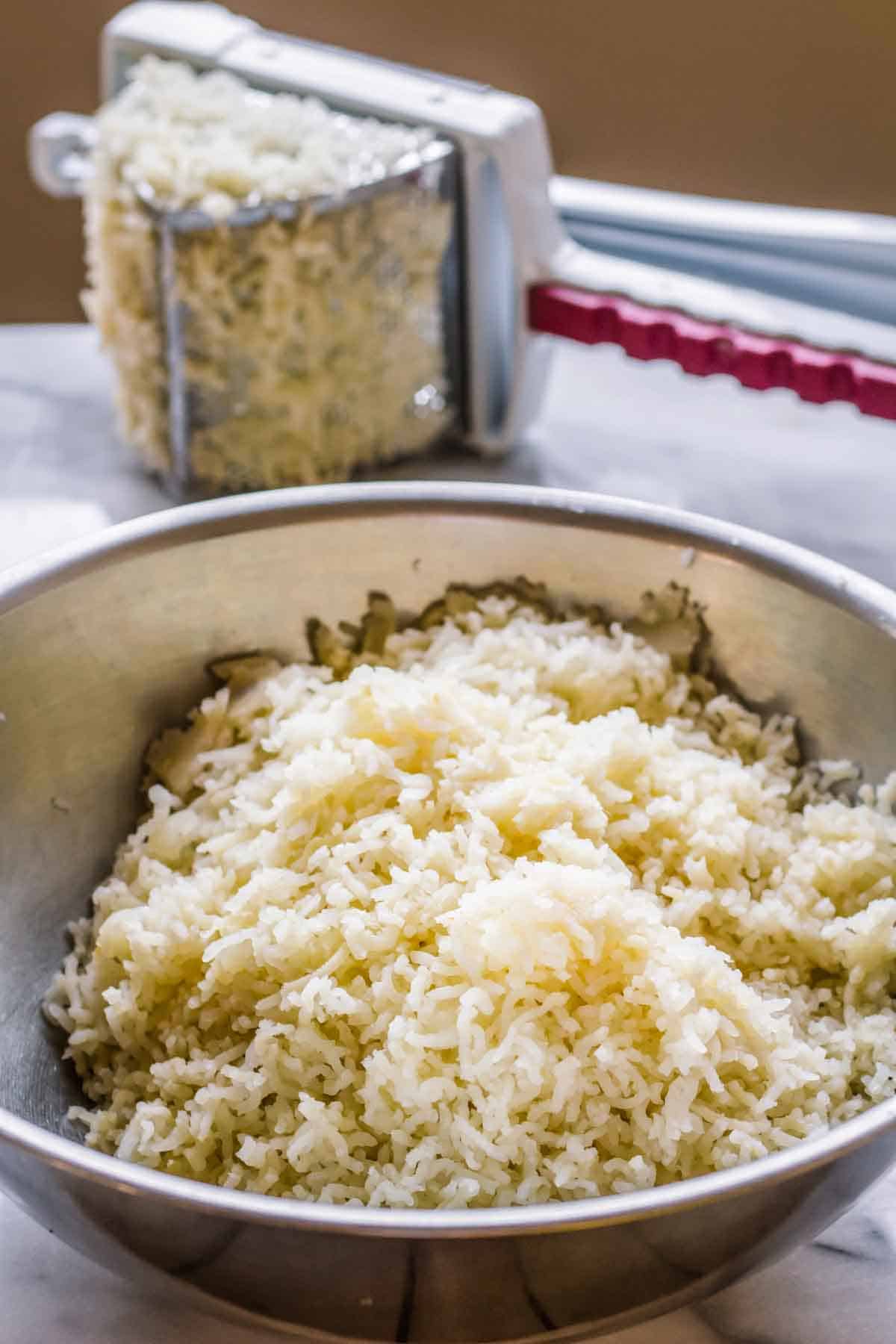 A bowl of hot riced potatoes to make gnocchi.