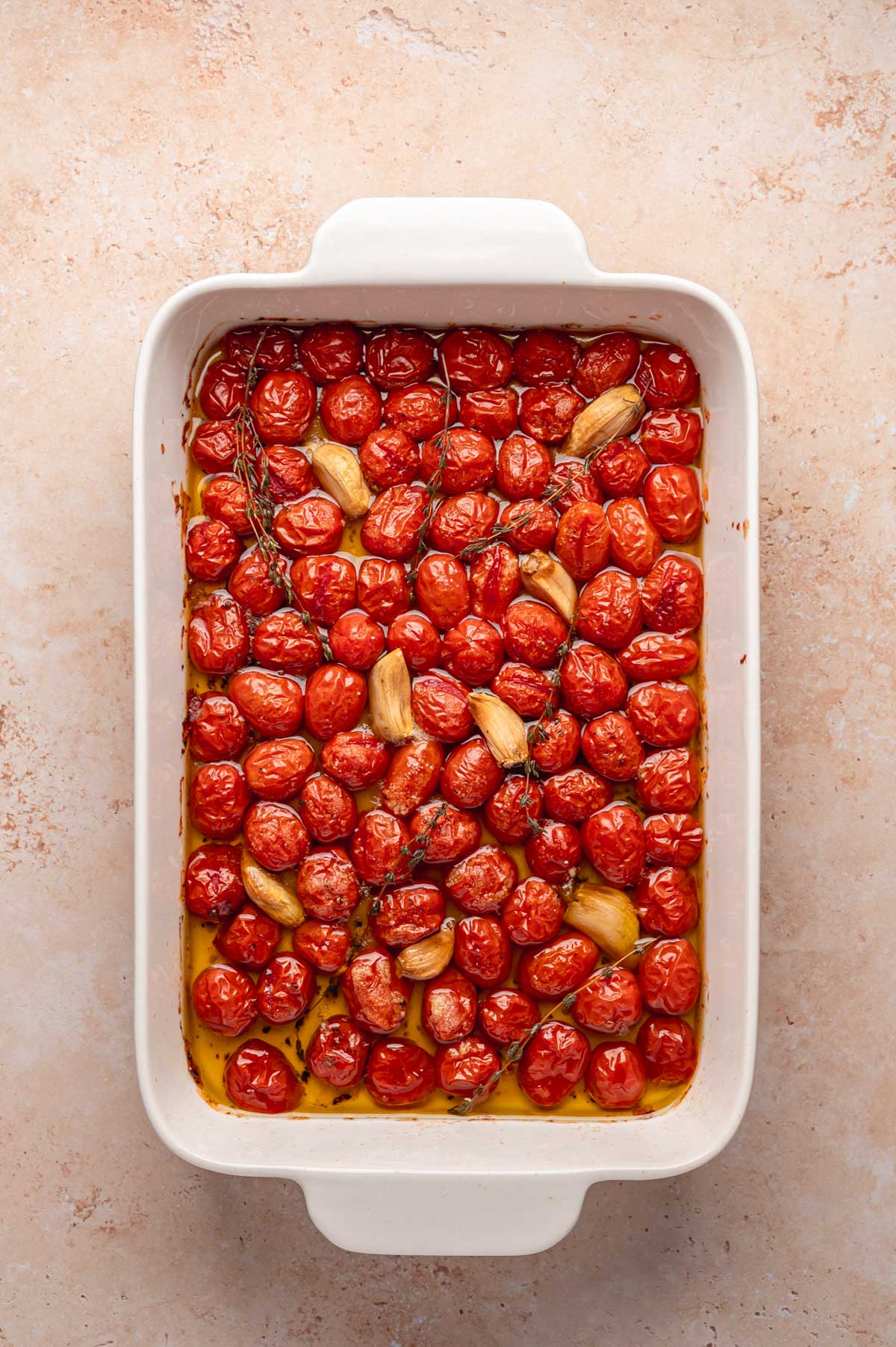 Wrinkled, blistered cherry tomatoes after roasting with garlic and thyme.