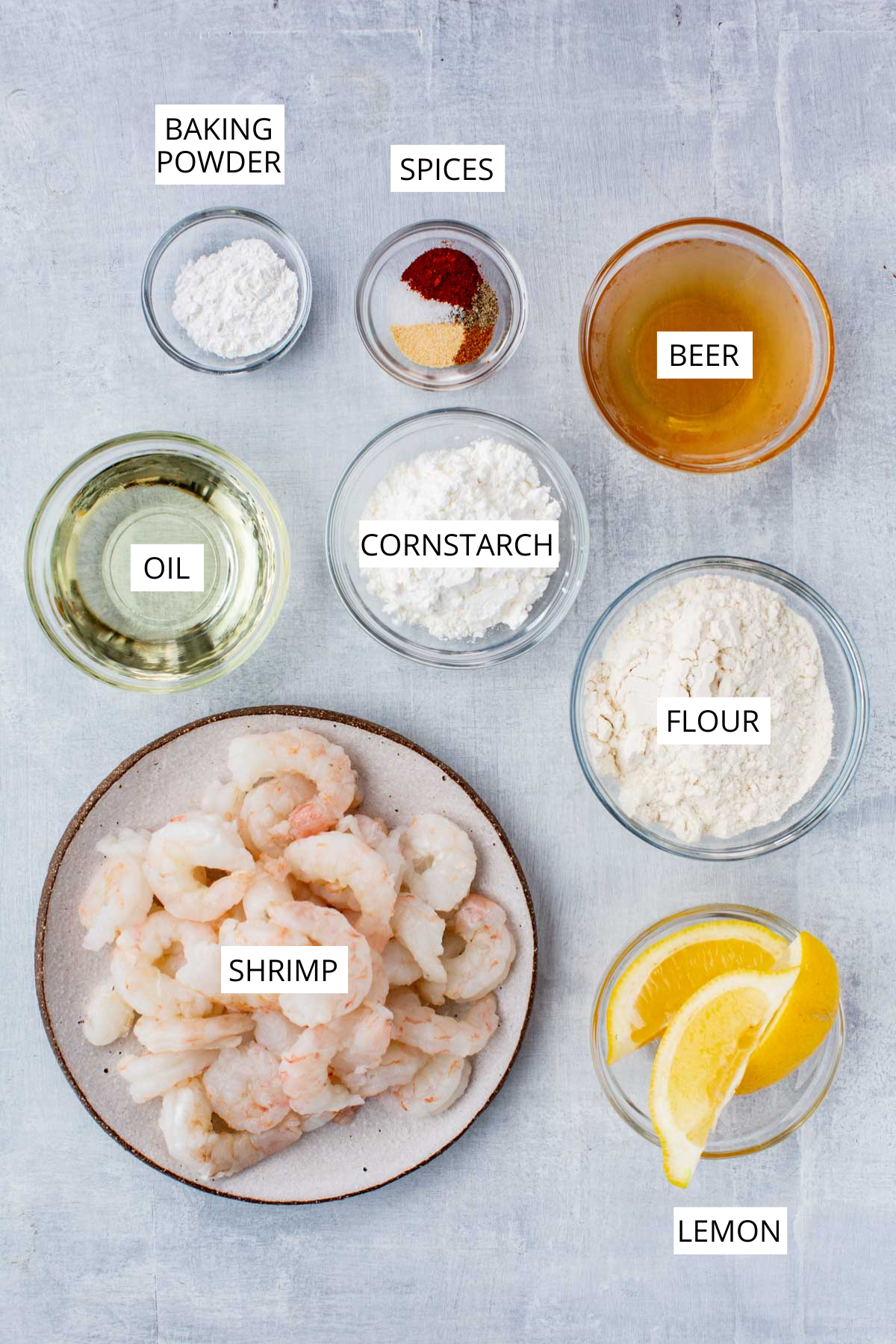 Flat lay of labeled ingredients for beer battered shrimp.