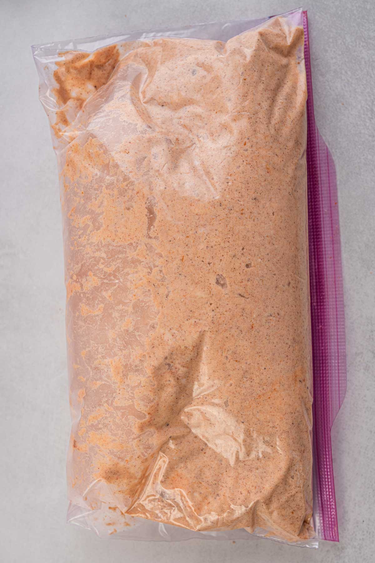 Pumpkin cannoli filling transferred to a large zip-top bag for easy piping into the shells.