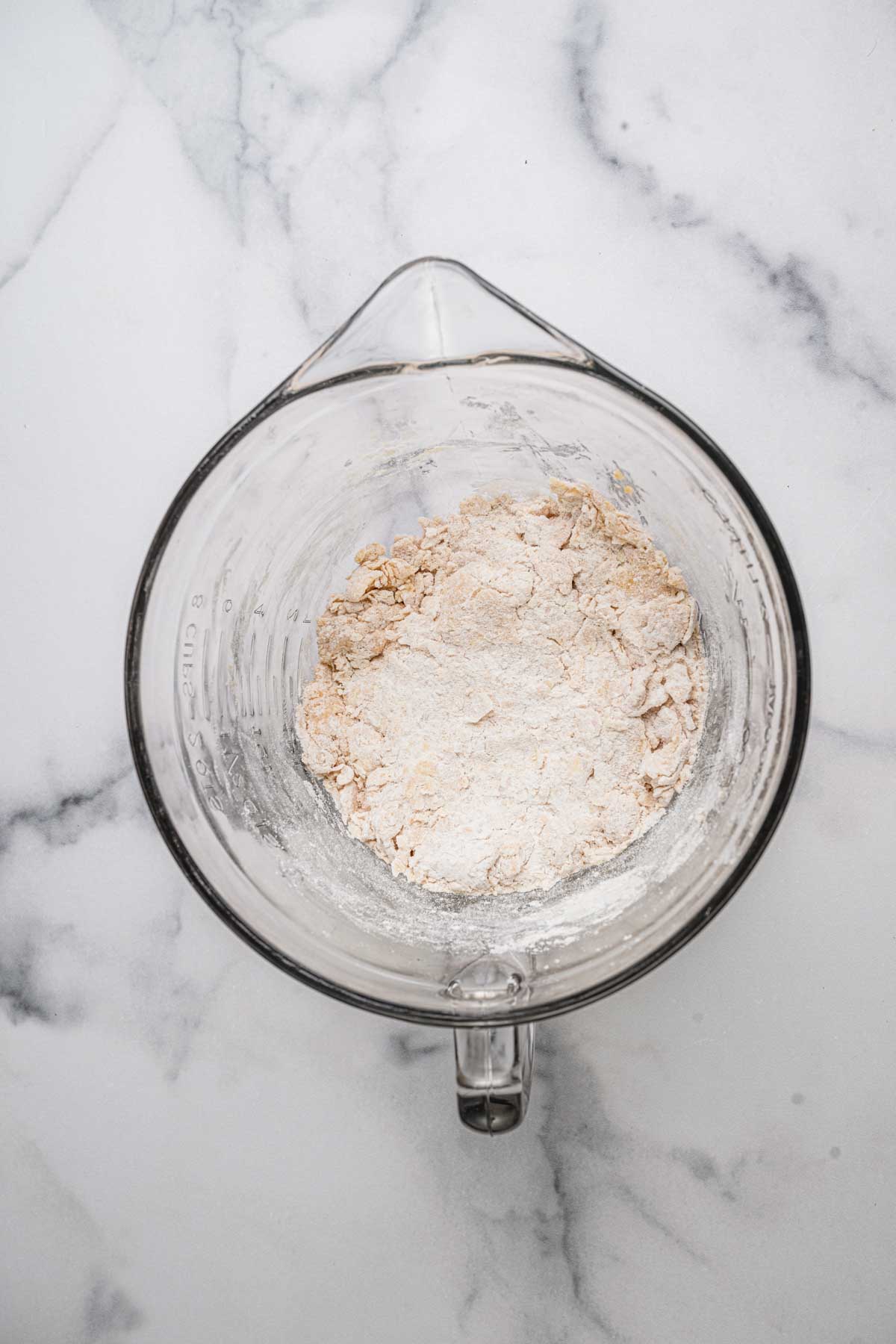 Cannoli dough being mixed in a bowl.