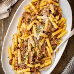 Platter of pasta alla Genovese with tender shredded beef, sweet onion sauce and freshly grated cheese.